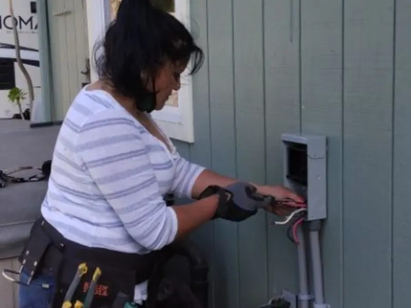 Licensed electrician wiring an exterior subpanel in Ramapo
